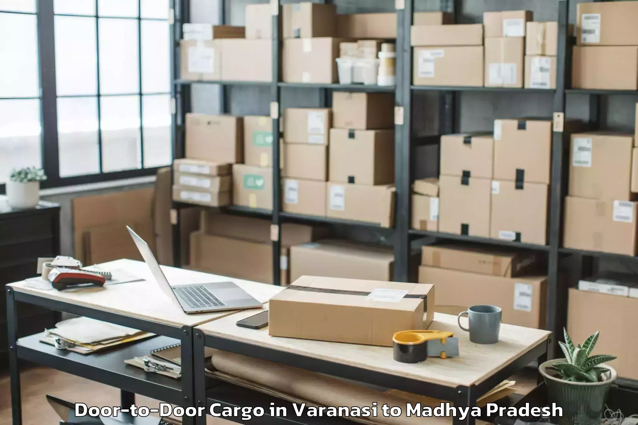 Affordable Varanasi to Indore Door To Door Cargo